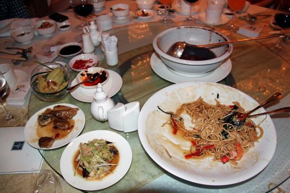 A beggar’s delight: Despite being transferred to smaller plates, this was the amount of unfinished food after an eight-course Chinese wedding dinner at Sheraton Towers (Source: Food Waste Republic)